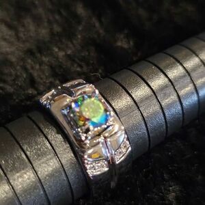 1CTW VVSD Fantasy Blue with Moissanite accents in .925 sterling silver. Size 12
